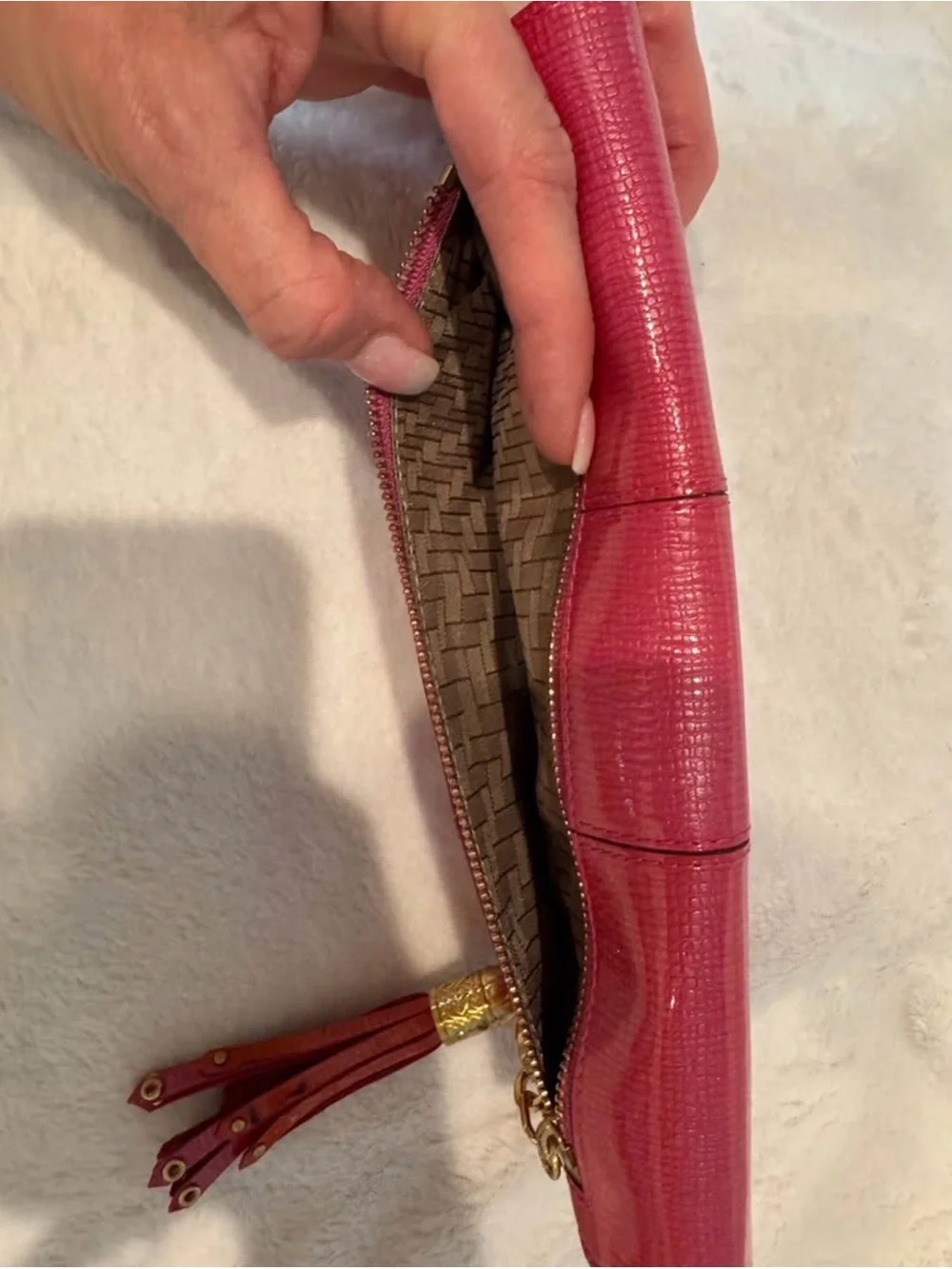 Cole Haan Pink-Red Textured Leather travel jewelry organizer with Gold Logo